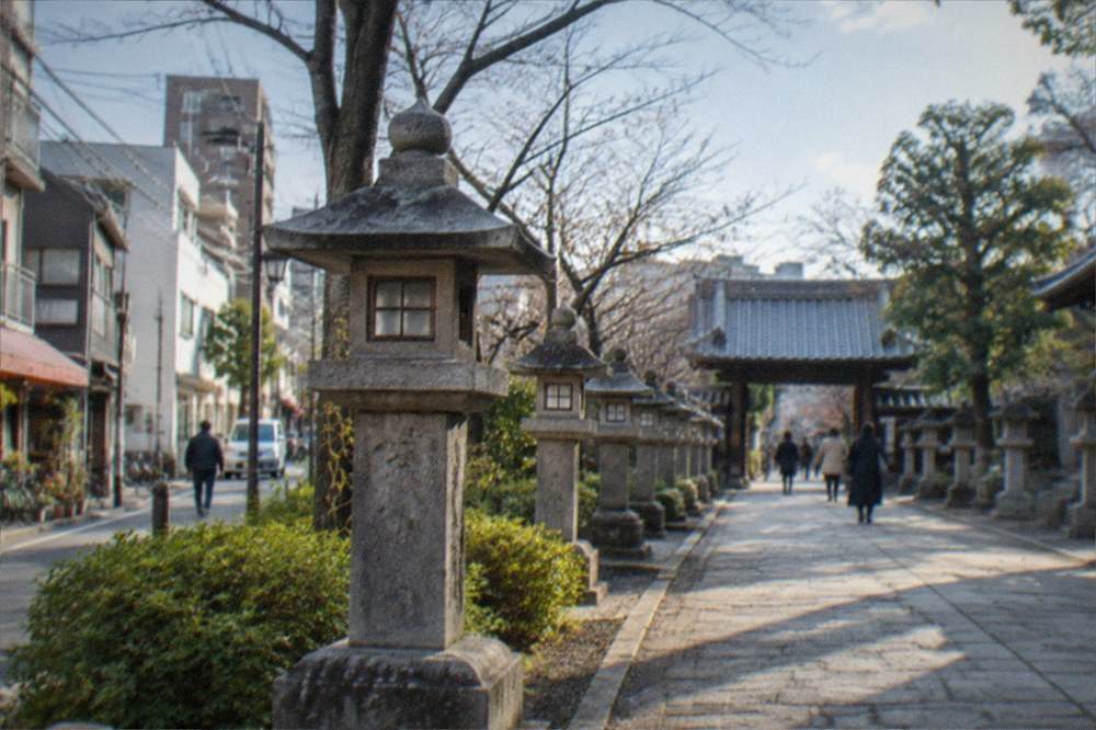 A stone lantern path outside a Zen temple in the old town