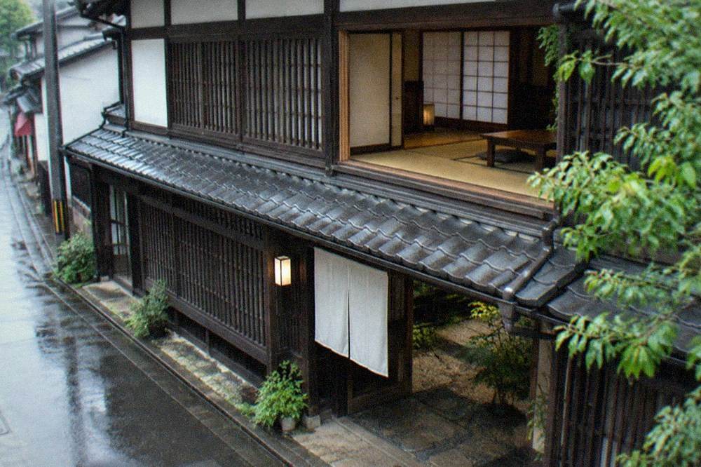 Tatami room interior of a restored merchant house with paper screens and wooden beams