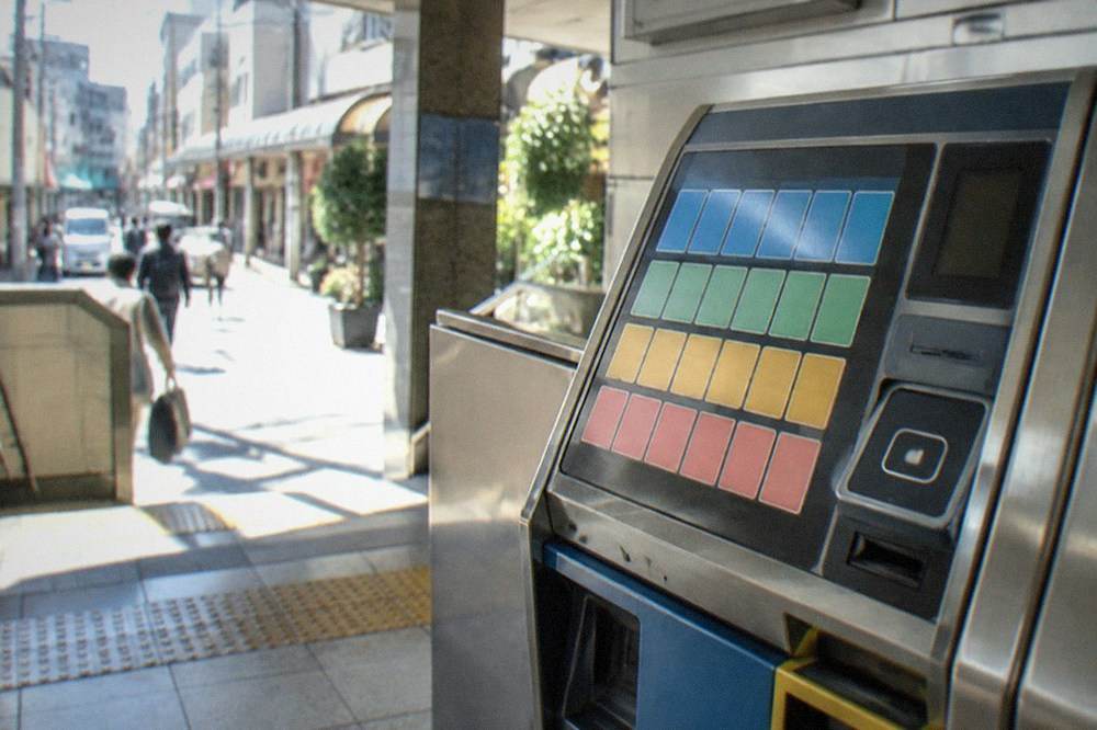 A ticket machine at a Fukuoka City Subway station showing fare zone buttons