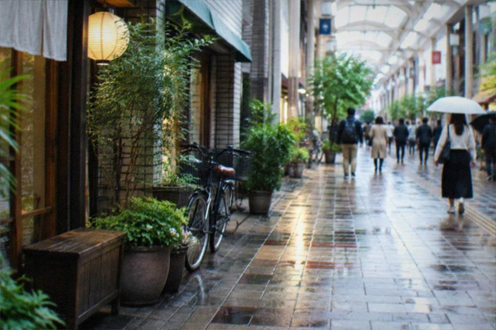 Commuters walking through a covered shopping arcade in the morning with shops opening