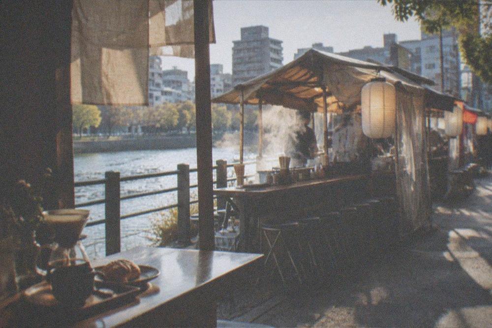 A quiet cafe counter with a pour-over coffee and a small morning pastry set
