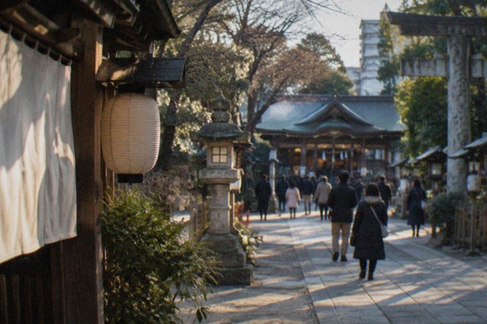 Illuminated shrine grounds in Fukuoka on a clear winter evening